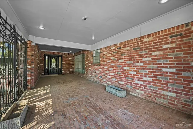 a view of a hallway with a chandelier