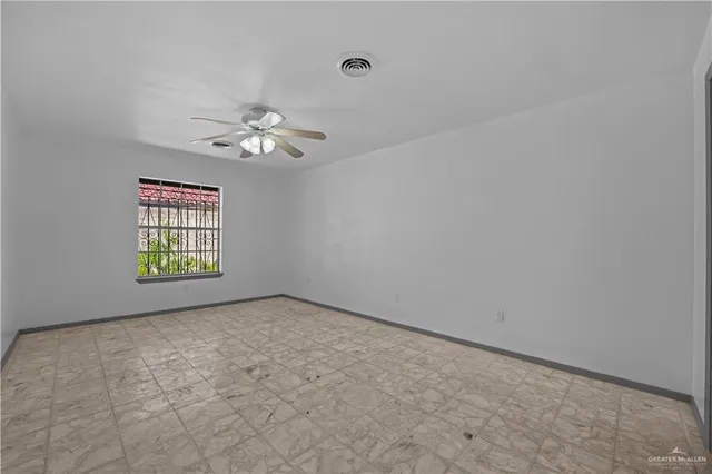 a kitchen with cabinets appliances and a sink