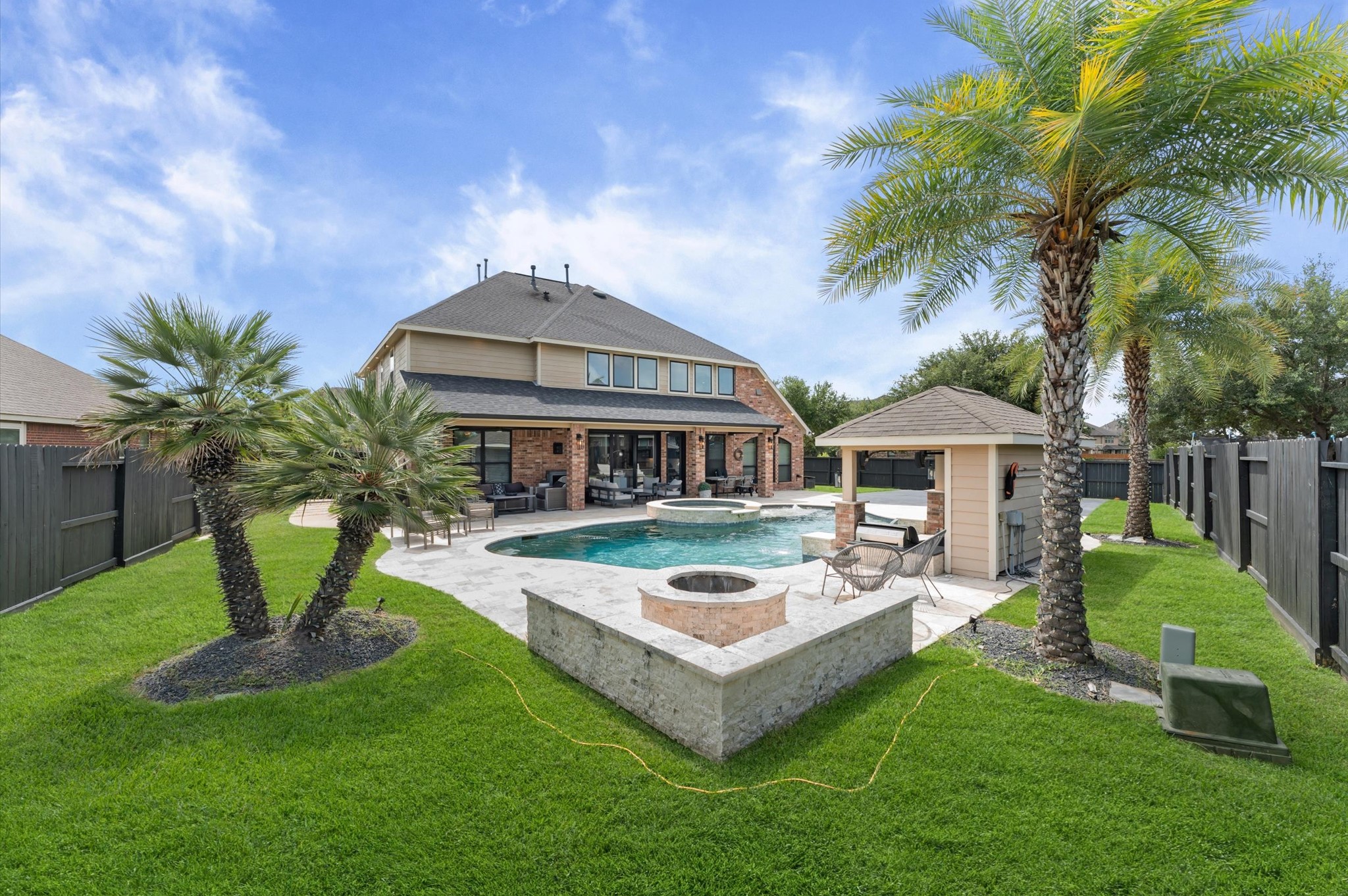 14016 Savannah Landing Lane Rosharon, TX 77583 - Photo 37 of 49 a view of a house with pool and porch