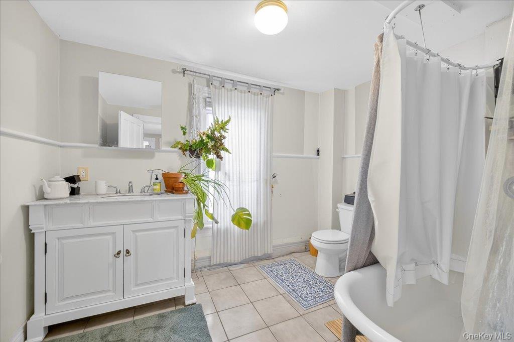 792 Springtown Road Rosendale, NY 12486 - Photo 12 of 45 Full bath featuring vanity and light tile patterned floors