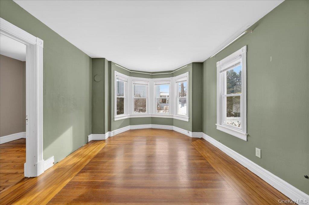 792 Springtown Road Rosendale, NY 12486 - Photo 24 of 45 Spare room featuring hardwood / wood-style floors and plenty of natural light
