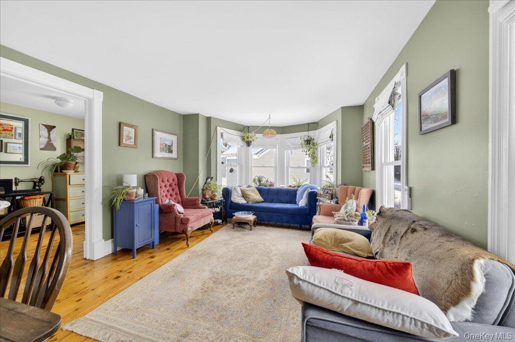 792 Springtown Road Rosendale, NY 12486 - Photo 3 of 45 Living room featuring hardwood / wood-style flooring