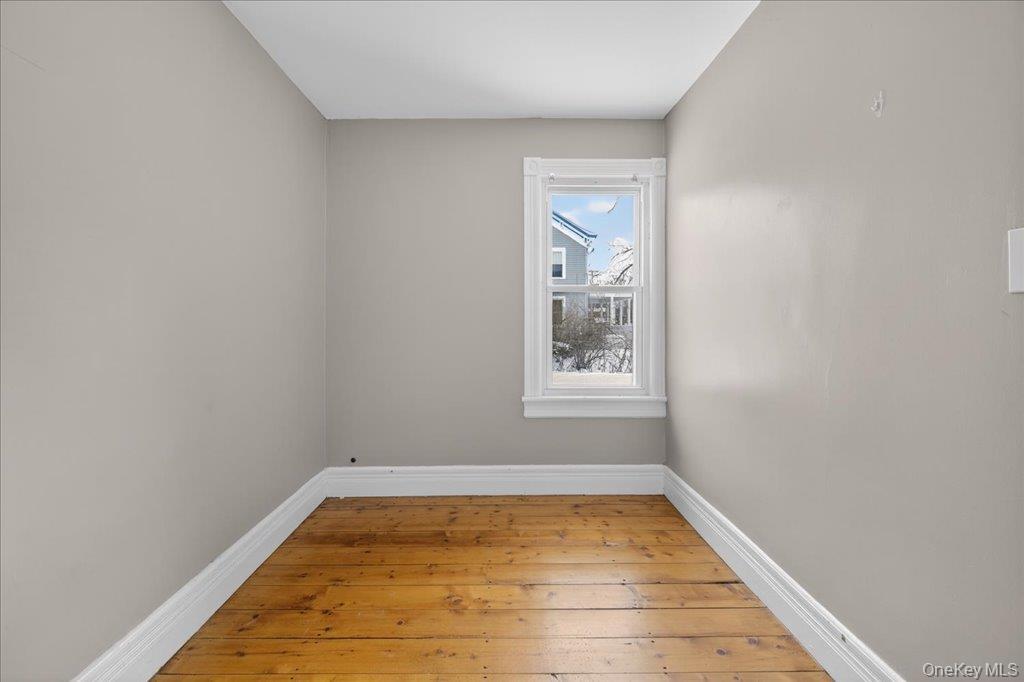 792 Springtown Road Rosendale, NY 12486 - Photo 42 of 45 Spare room with baseboards and light wood-type flooring