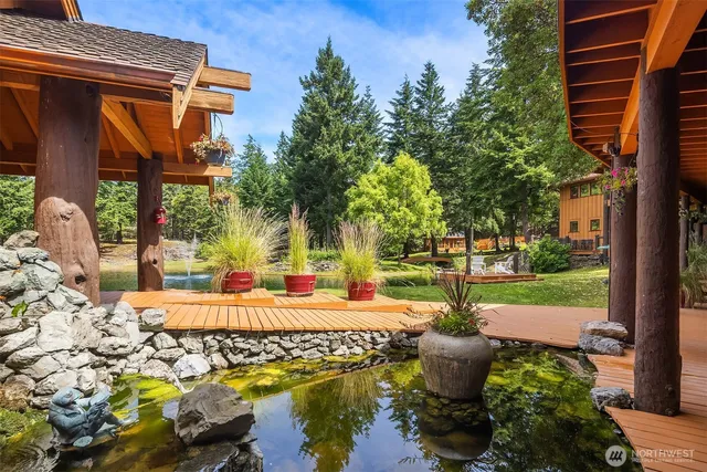 a house view with a sitting space and garden space
