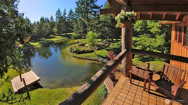a view of a chairs and table in the patio