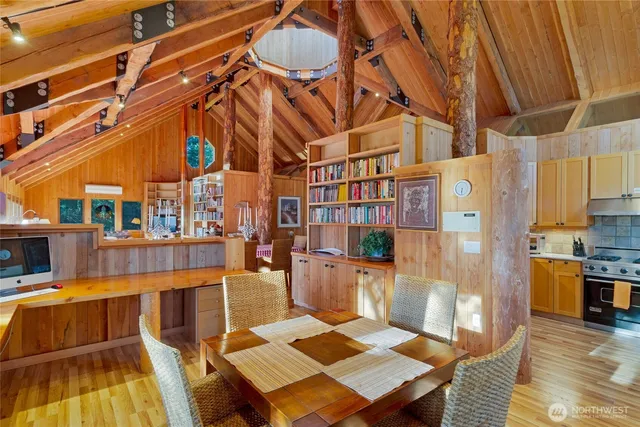 a view of a patio with a table and chairs