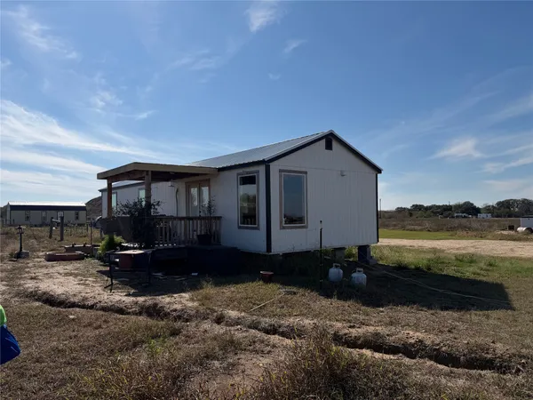 a view of a house with a porch