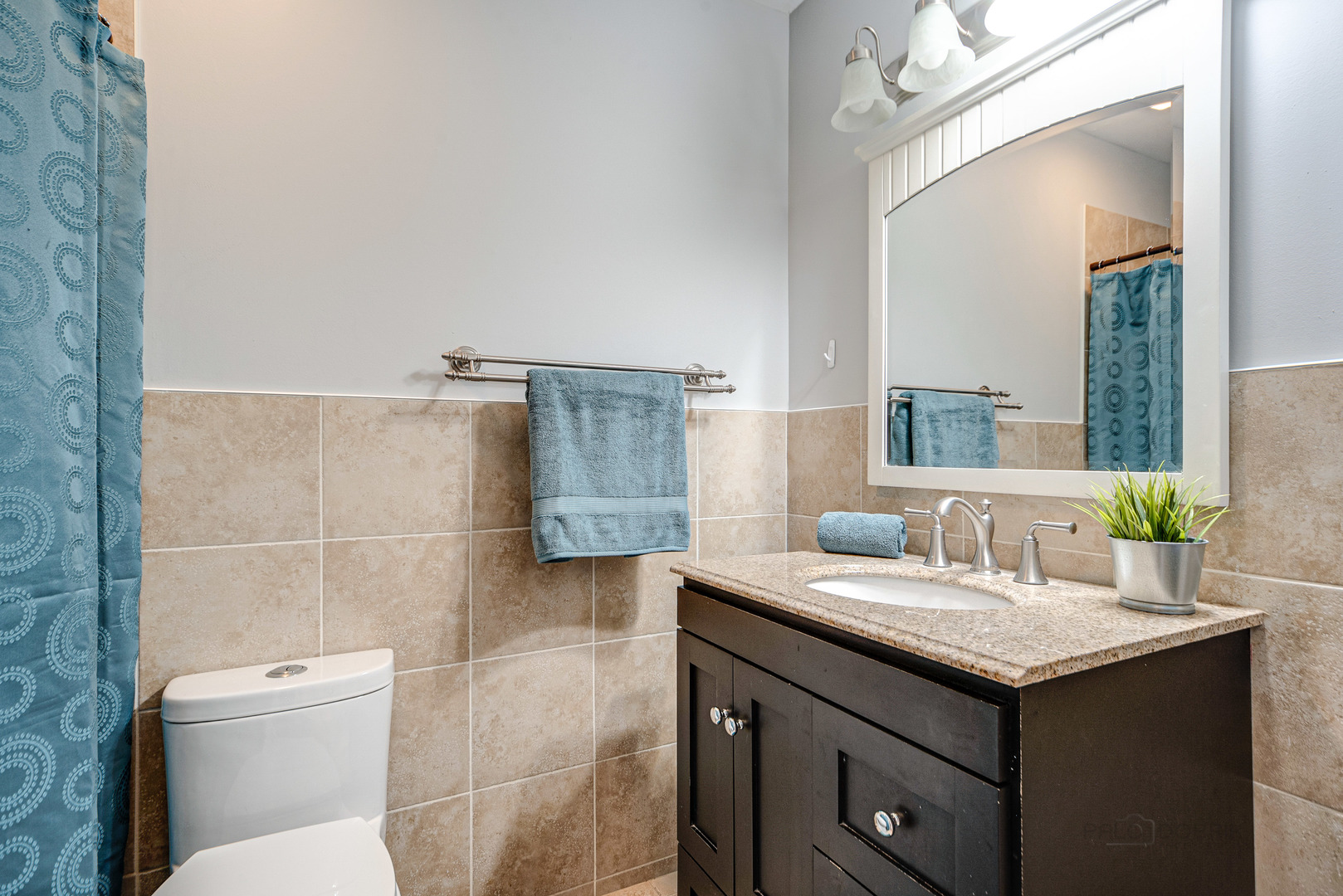 110 Haman Road Inverness, IL 60010 - Photo 11 of 30 a bathroom with a sink toilet and mirror