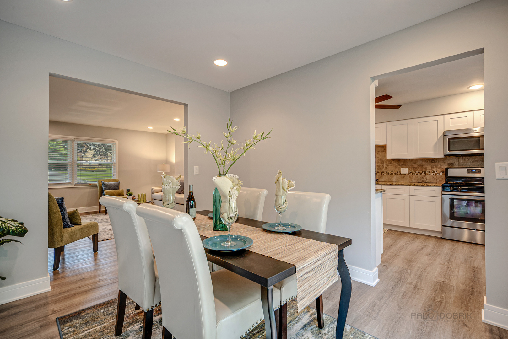 110 Haman Road Inverness, IL 60010 - Photo 6 of 30 a view of a dining room with furniture and wooden floor
