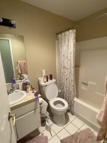 a bathroom with a sink and mirror