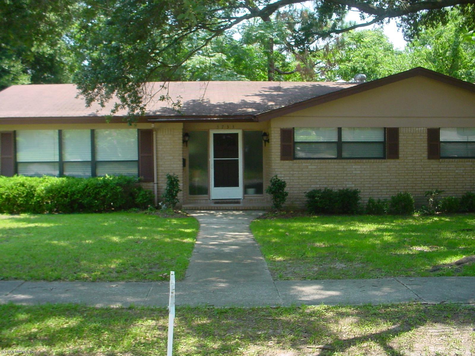 3733 Gurley Road Jacksonville, FL 32277 - Photo 1 of 6 a view of a back yard of the house
