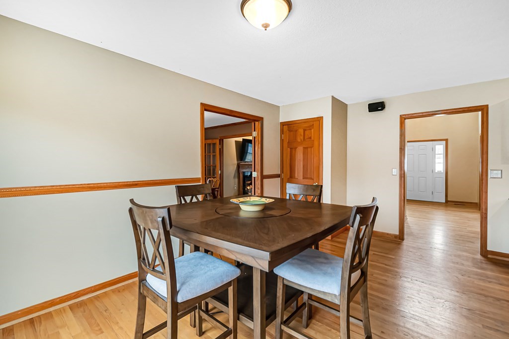 34 Schneider Road Somers, CT 06071 - Photo 14 of 42 a view of a dining room with furniture and wooden floor
