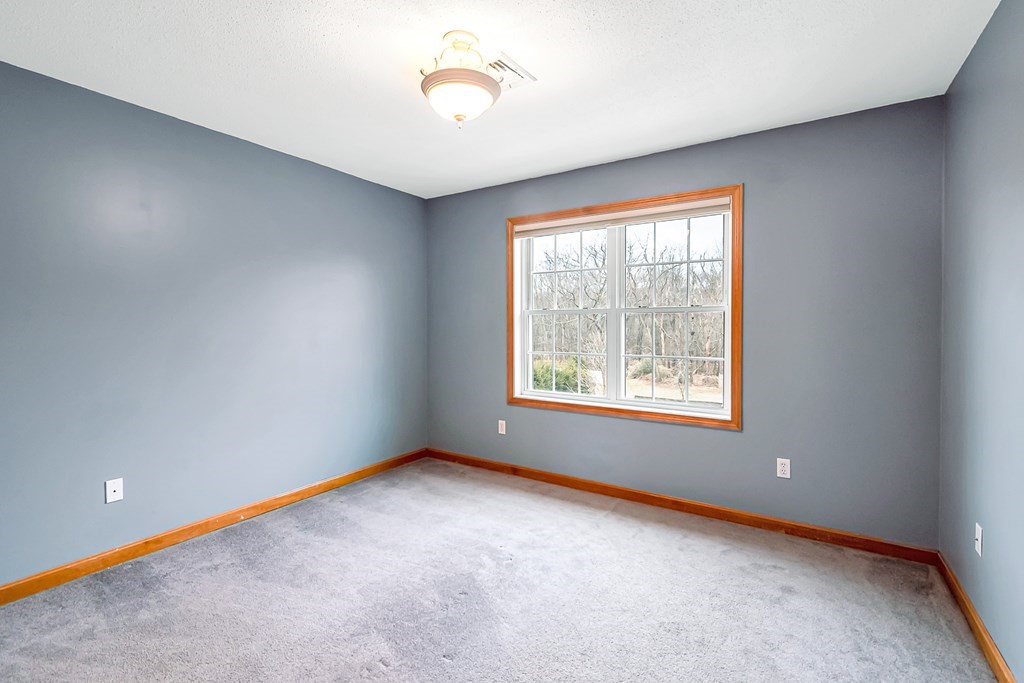 34 Schneider Road Somers, CT 06071 - Photo 27 of 42 an empty room with a window