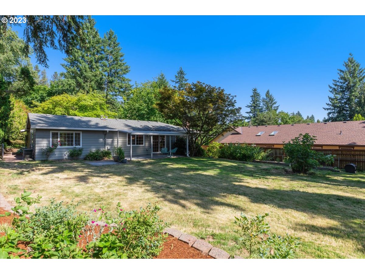 4635 Southwest Shattuck Road Portland, OR 97221 - Photo 30 of 36 a view of a house with a yard