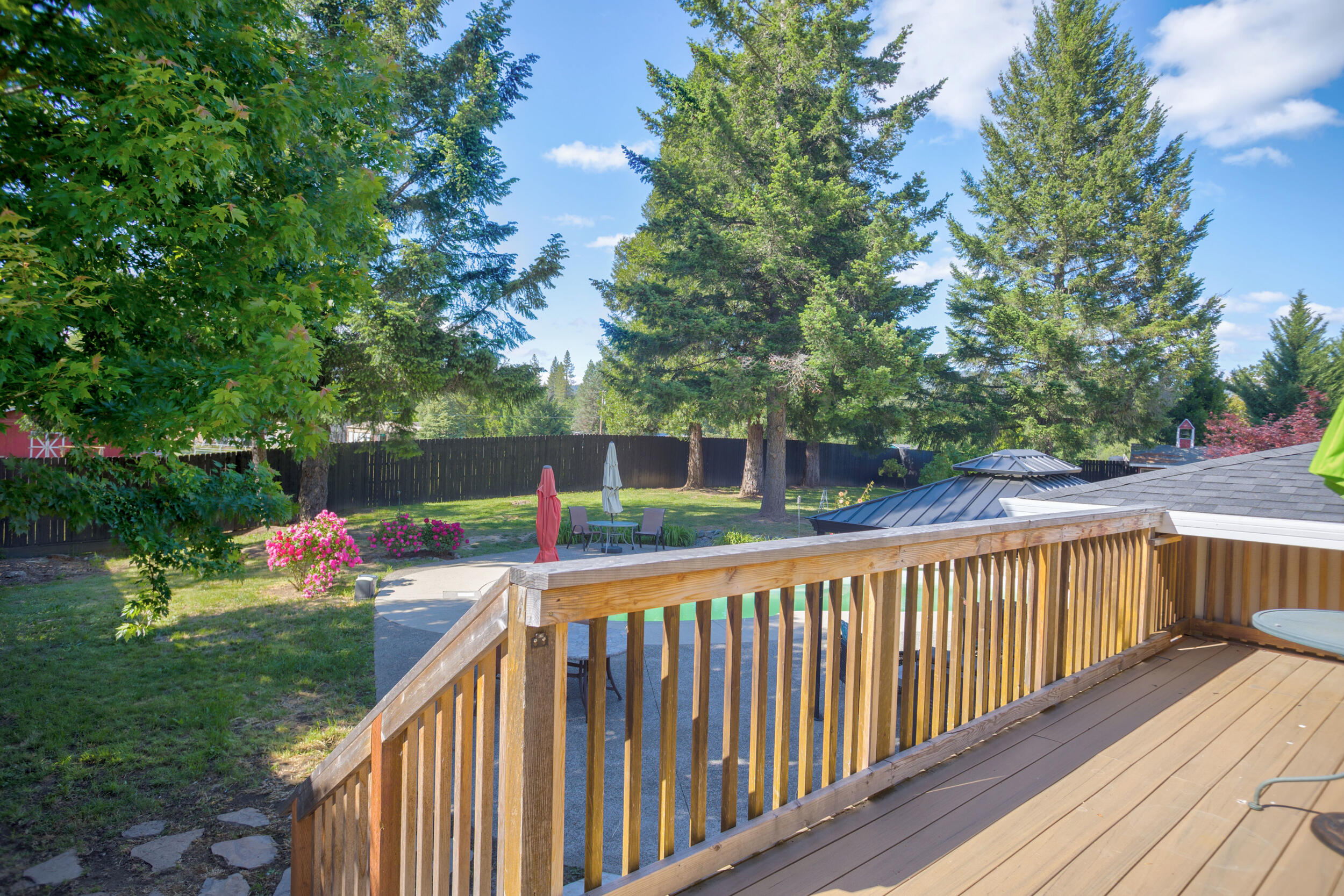 255 Queens Branch Road Rogue River, OR 97537 - Photo 23 of 60 a view of a balcony with wooden floor