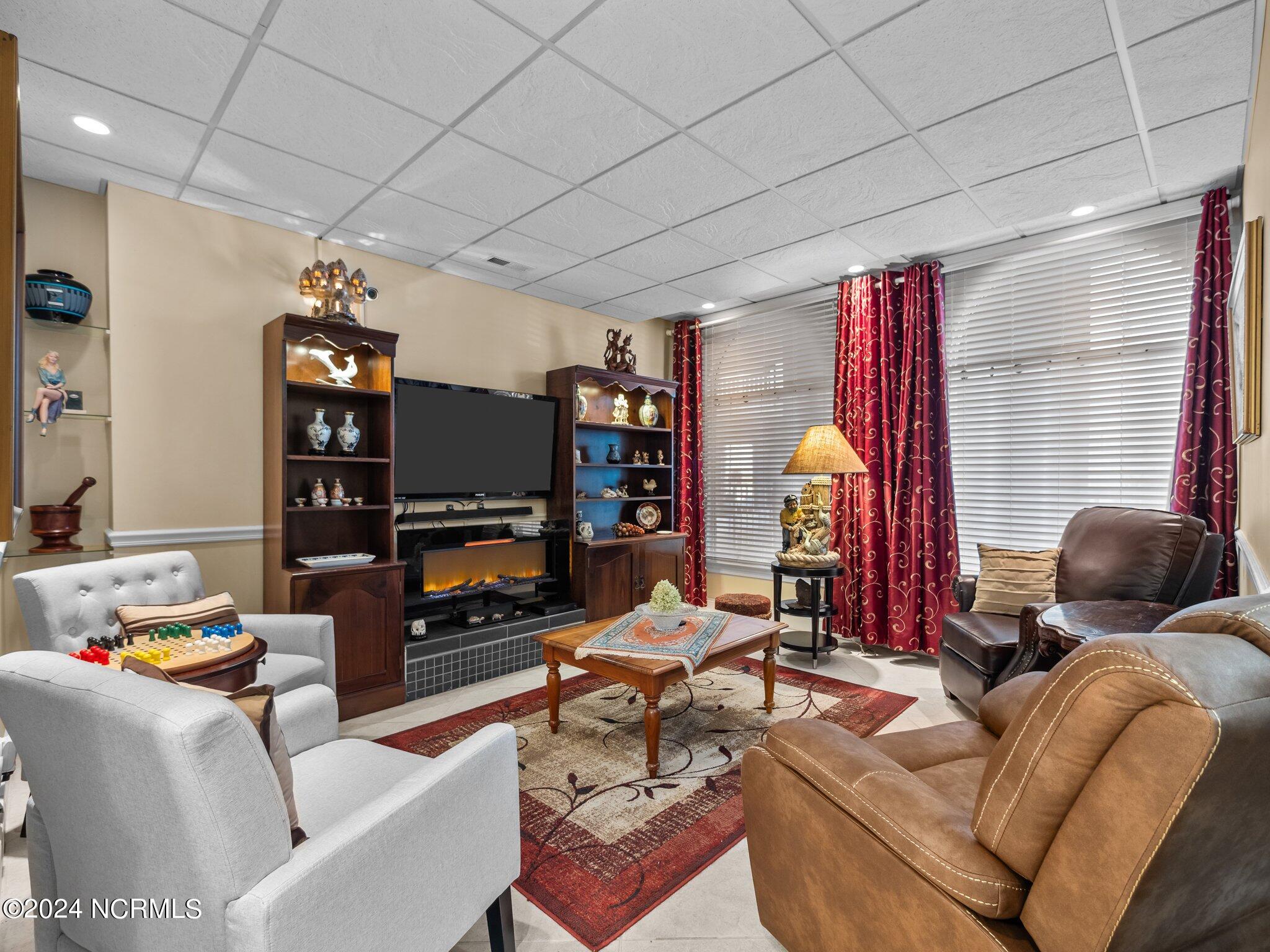 2000 New River Inlet Road, Unit 1004 North Topsail Beach, NC 28460 - Photo 25 of 48 Living room