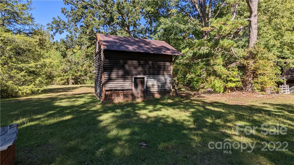 3137 Pink Plyler Road Lancaster, SC 29720 - Photo 18 of 20 a view of a house with a yard