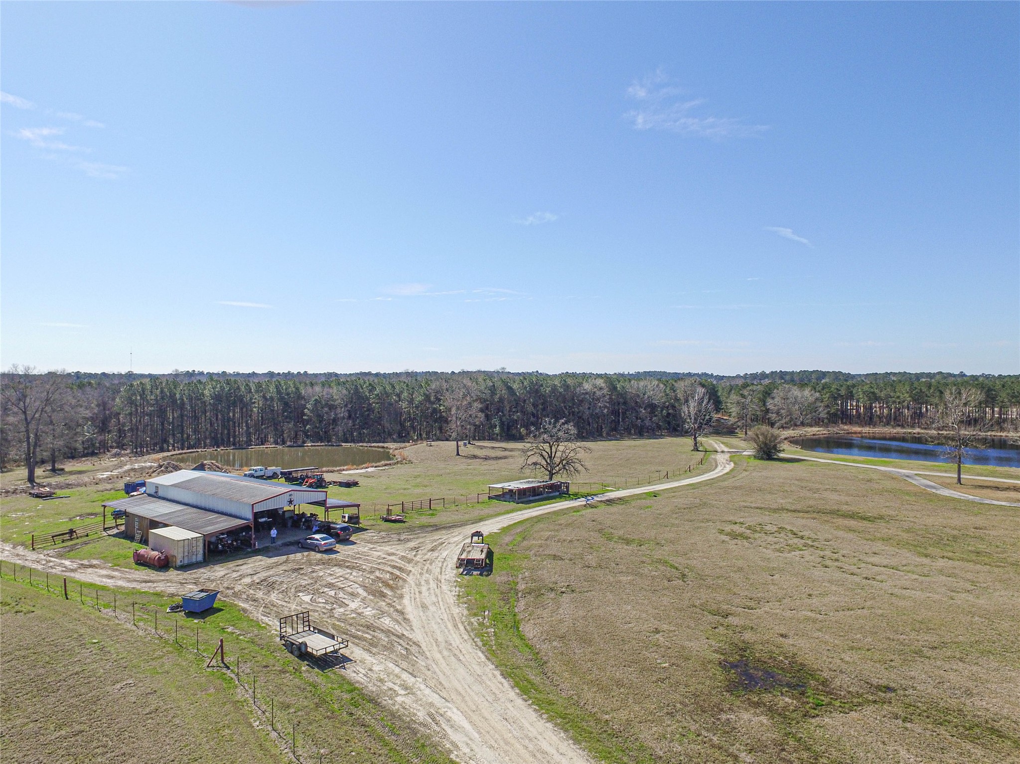 684 Hooks Road Corrigan, TX 75939 - Photo 1 of 34 a view of swimming pool and lake view