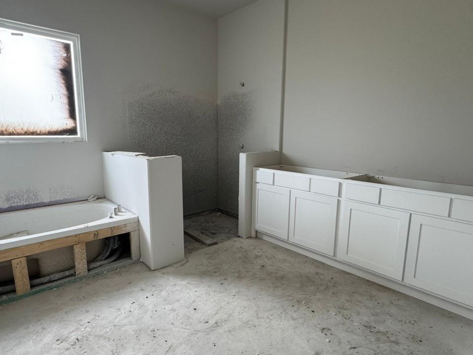2305 Quartz Street Krum, TX 76249 - Photo 11 of 18 a utility room with a window