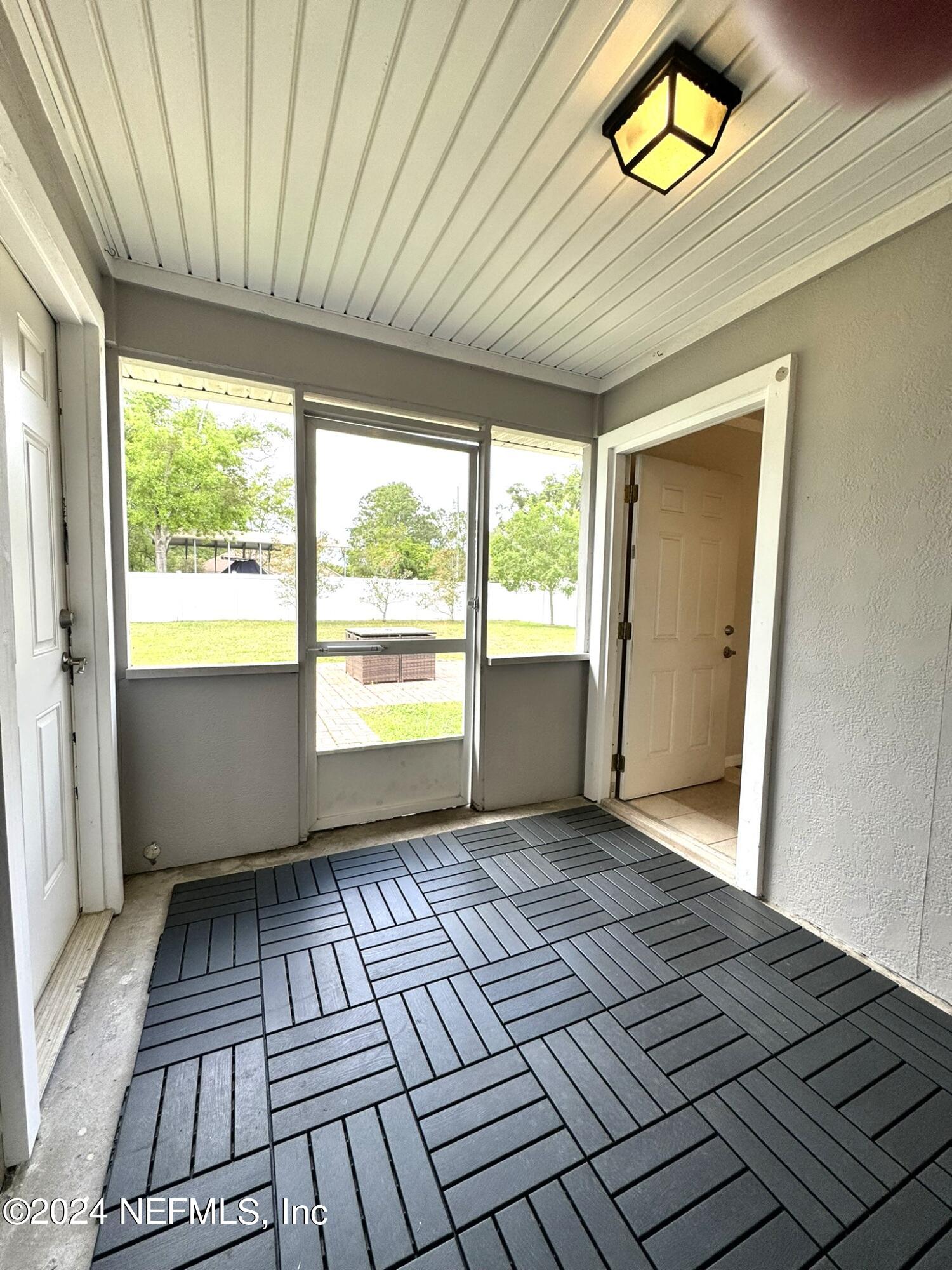 4780 Raggedy Point Road Fleming Island, FL 32003 - Photo 28 of 30 28 Screen Porch