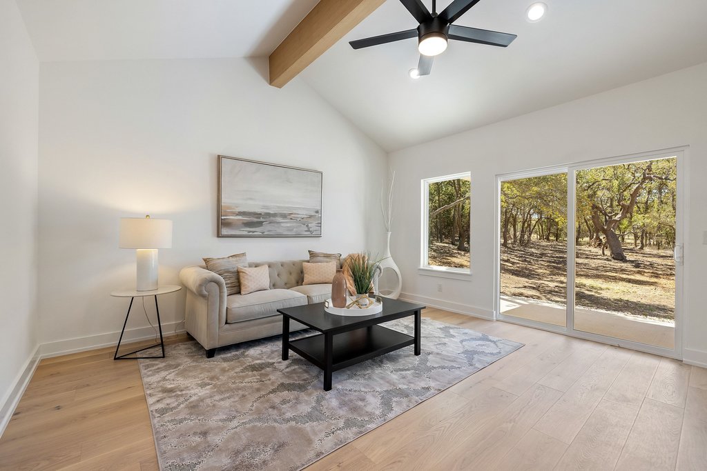 408 Rust Ranch Road Blanco, TX 78606 - Photo 6 of 35 Living room with ceiling fan, light wood-type flooring, vaulted ceiling with beams, and recessed lighting