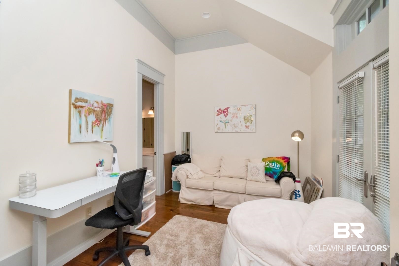 4810 Mums Court Mobile, AL 36608 - Photo 20 of 50 Office area with dark wood-style flooring and vaulted ceiling
