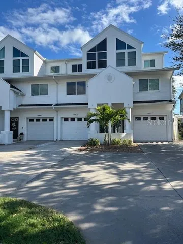 a view of a house with a street