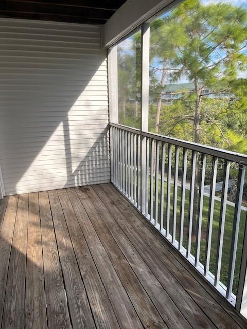 14839 Seminole Trail Seminole, FL 33776 - Photo 11 of 35 a view of balcony with wooden floor