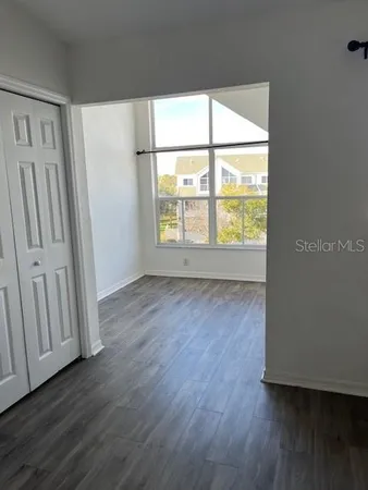 a view of entryway with wooden floor