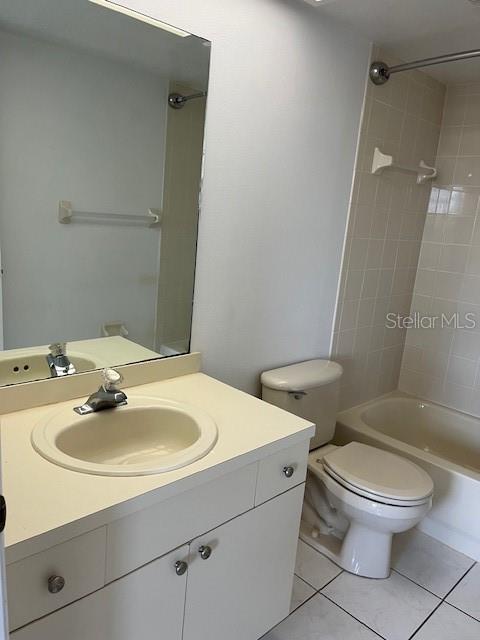 14839 Seminole Trail Seminole, FL 33776 - Photo 17 of 35 a white toilet sitting next to a bathroom sink