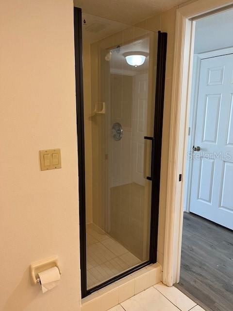 14839 Seminole Trail Seminole, FL 33776 - Photo 20 of 35 a bathroom with a glass door shower