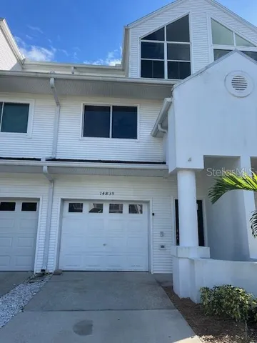a view of a house with a garage