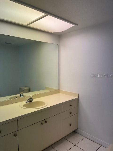 14839 Seminole Trail Seminole, FL 33776 - Photo 21 of 35 a bathroom with a sink and a mirror