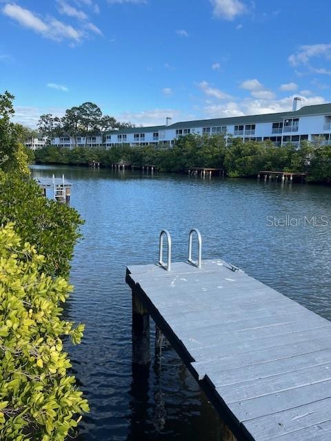 14839 Seminole Trail Seminole, FL 33776 - Photo 33 of 35 a view of a lake with a terrace