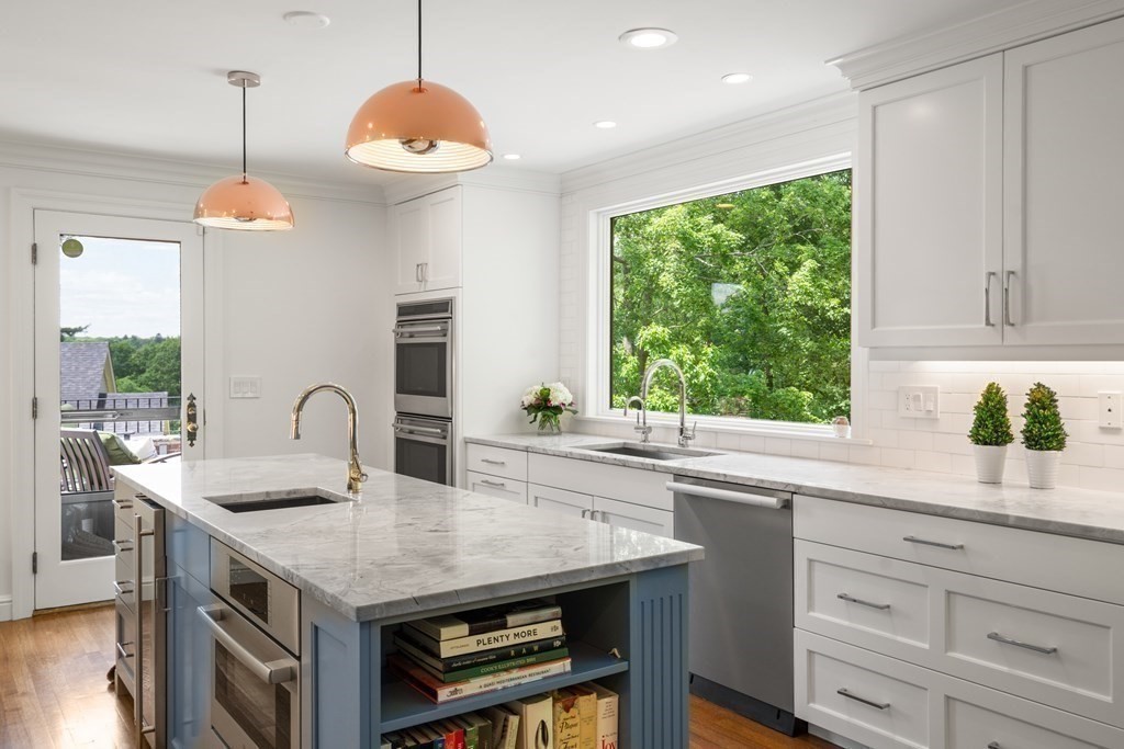 32 Maugus Avenue Wellesley, MA 02481 - Photo 13 of 42 a kitchen with a table and chairs