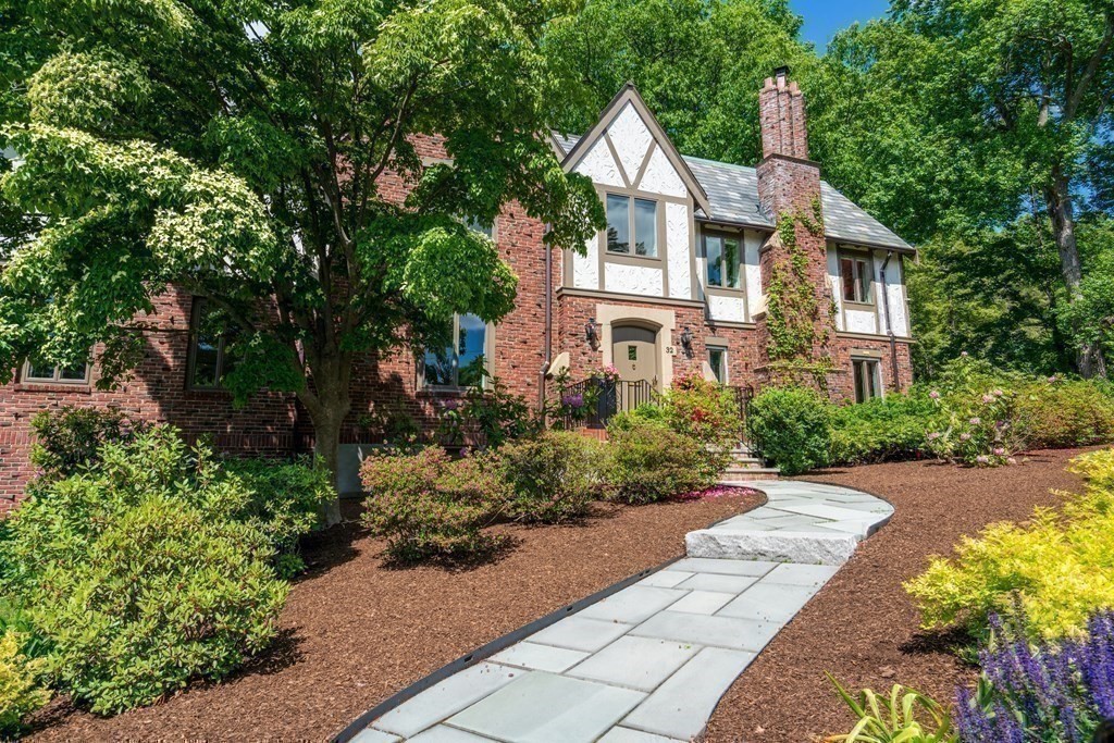 32 Maugus Avenue Wellesley, MA 02481 - Photo 2 of 42 a front view of a house with a yard and a tree