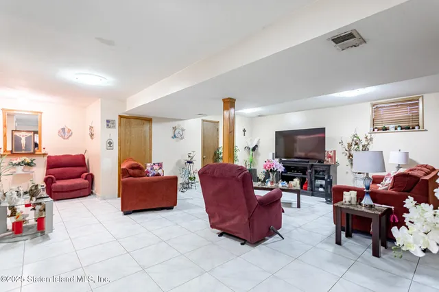 a kitchen with granite countertop a sink stainless steel appliances and cabinets