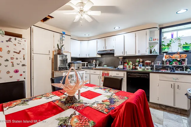 a aerial view of a house with a yard