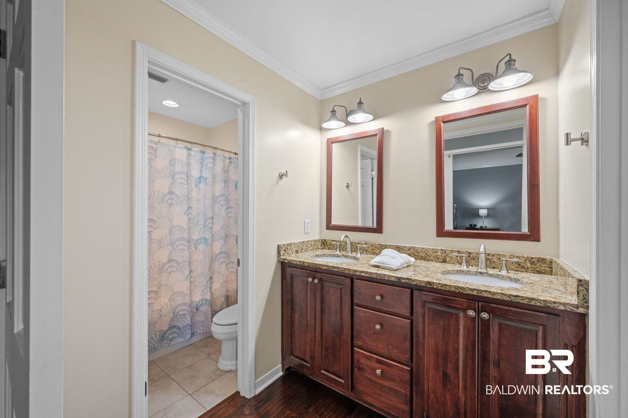 20037 County Road 33 Fairhope, AL 36532 - Photo 24 of 79 Bathroom with toilet, vanity, crown molding, a shower with curtain, and tile patterned floors
