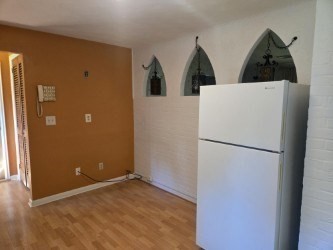 1 Ridgehill Road Canton, MA 02021 - Photo 11 of 39 a view of kitchen with refrigerator and wooden floor