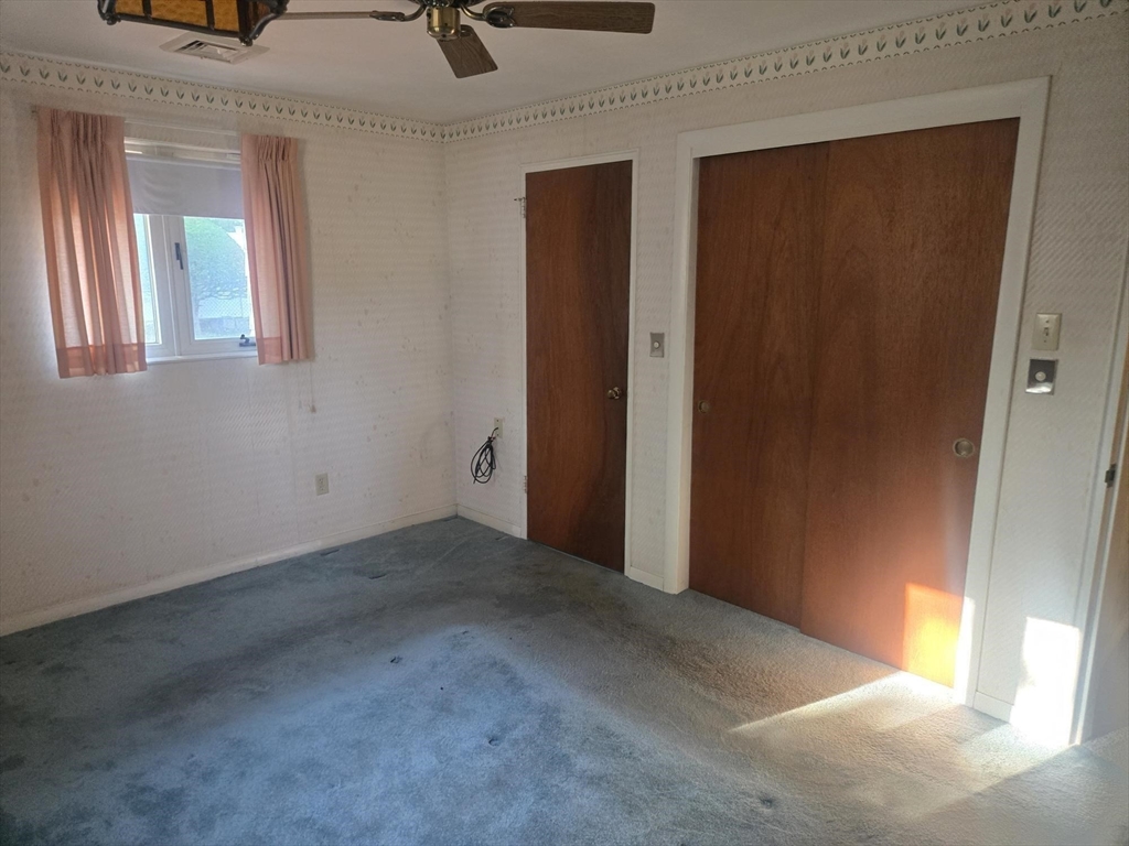 1 Ridgehill Road Canton, MA 02021 - Photo 16 of 39 an empty room that has a window