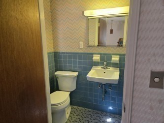 1 Ridgehill Road Canton, MA 02021 - Photo 18 of 39 a bathroom with a toilet a sink and mirror