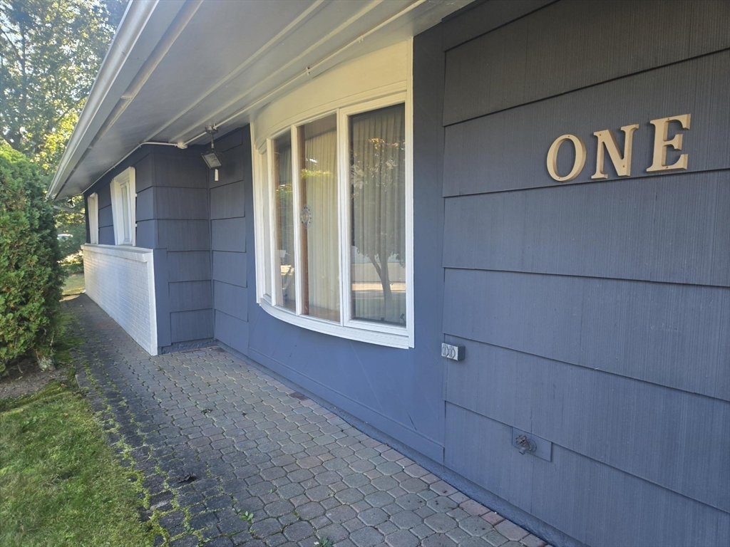 1 Ridgehill Road Canton, MA 02021 - Photo 2 of 39 a view of a front of house with a street
