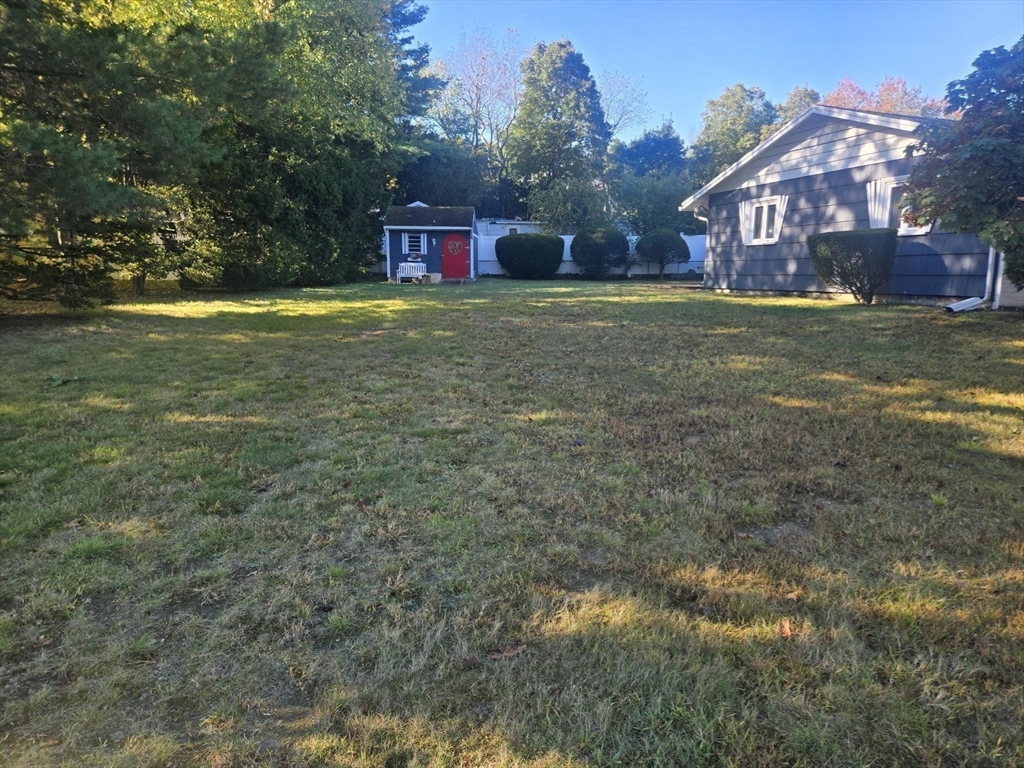 1 Ridgehill Road Canton, MA 02021 - Photo 24 of 39 a view of a house with a big yard