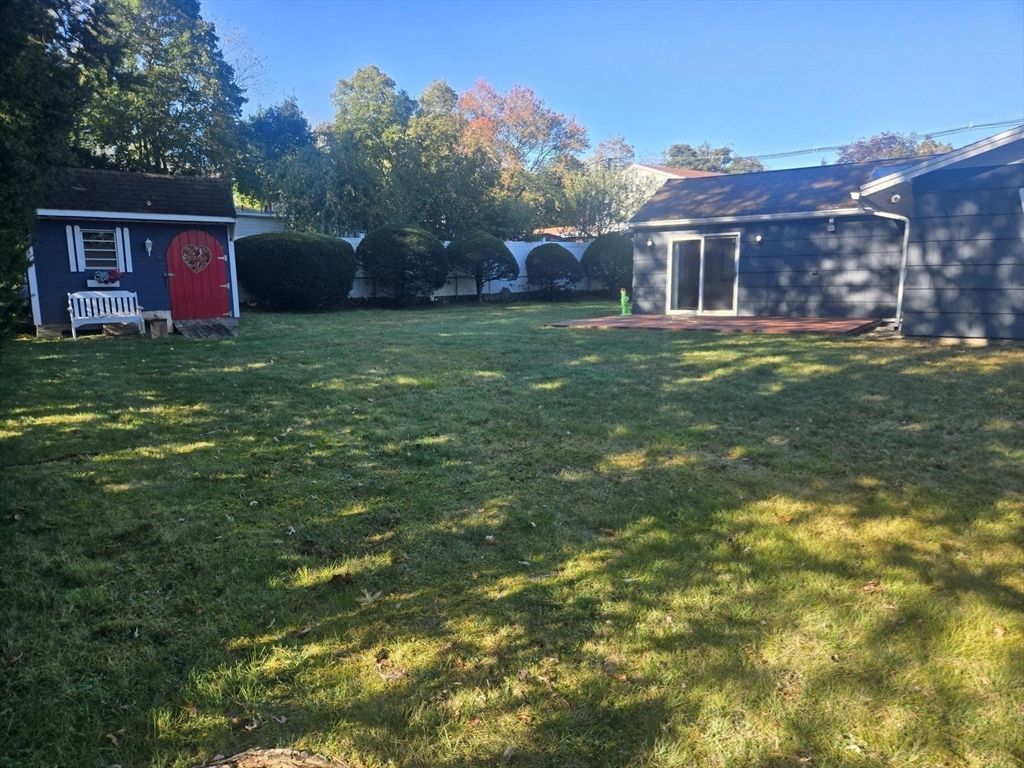 1 Ridgehill Road Canton, MA 02021 - Photo 25 of 39 a view of a house with a backyard