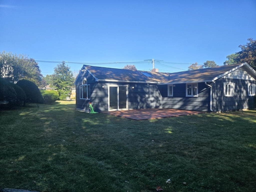 1 Ridgehill Road Canton, MA 02021 - Photo 26 of 39 a view of a house with a yard