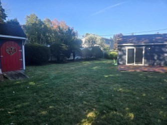 1 Ridgehill Road Canton, MA 02021 - Photo 31 of 39 a view of a house with a yard