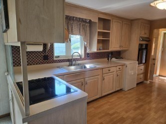 1 Ridgehill Road Canton, MA 02021 - Photo 8 of 39 a kitchen with stainless steel appliances granite countertop a sink stove and refrigerator