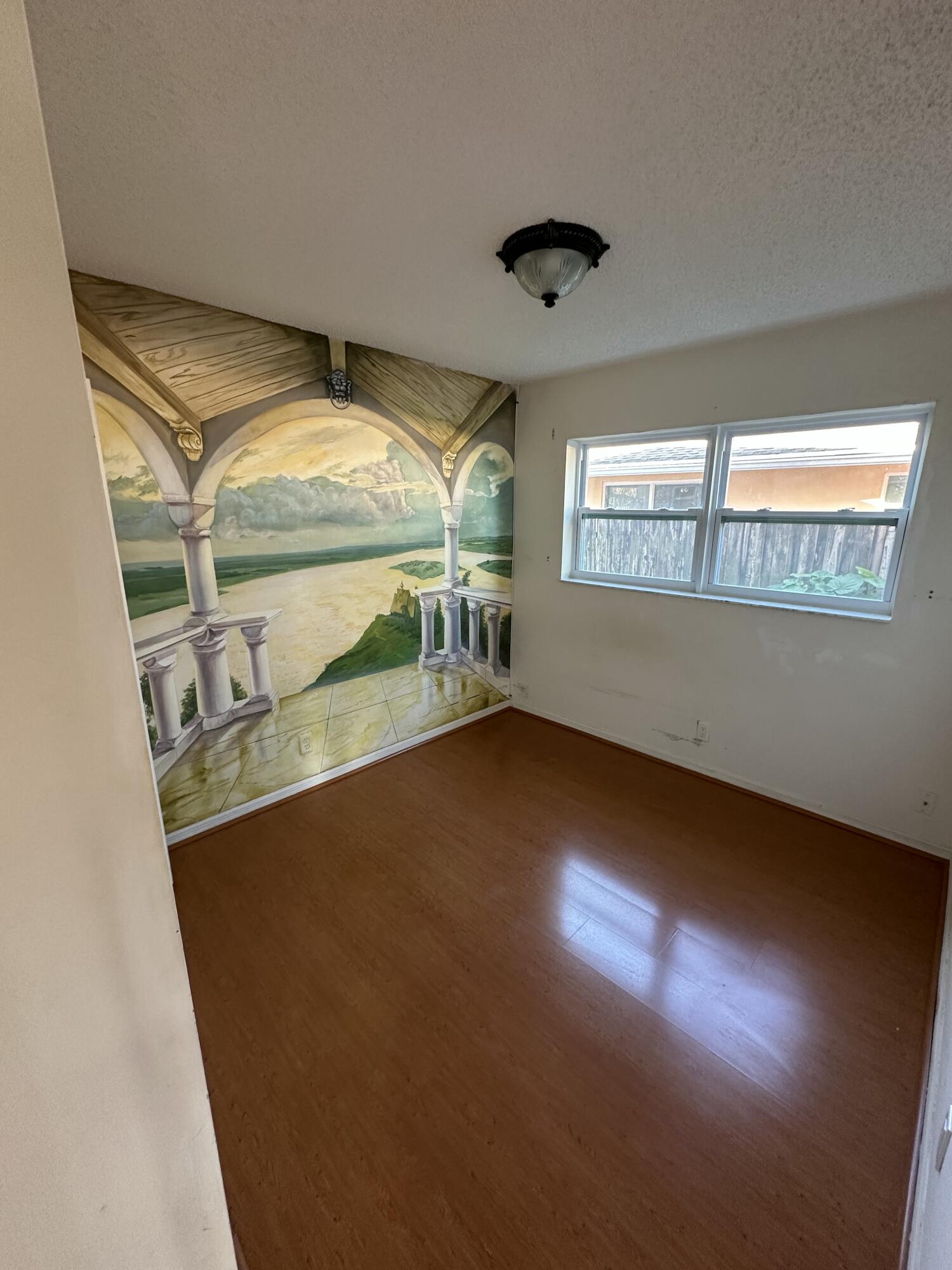 3291 Southwest 4th Street Deerfield Beach, FL 33442 - Photo 11 of 38 an empty room with windows