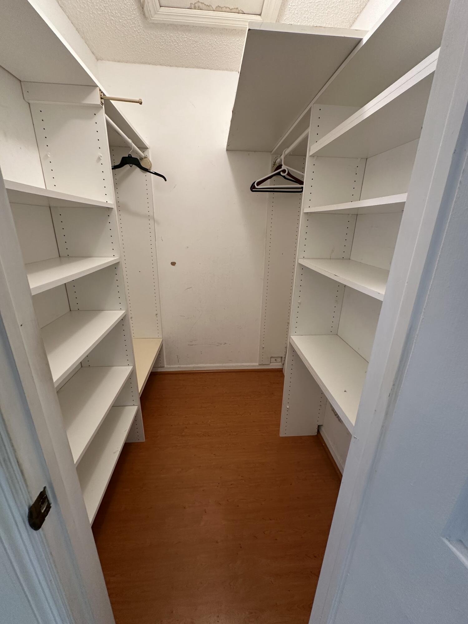 3291 Southwest 4th Street Deerfield Beach, FL 33442 - Photo 24 of 38 a view of an empty walk in closet
